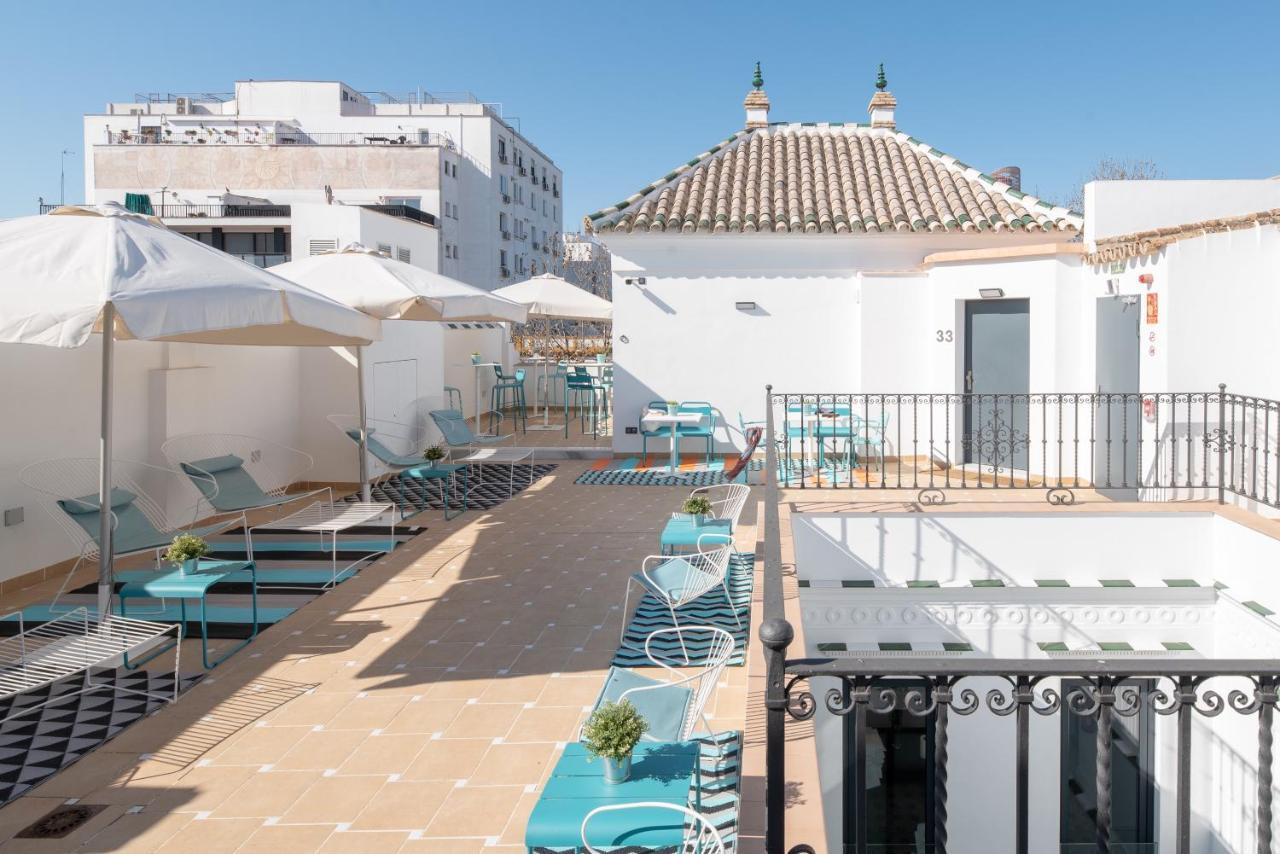 Uma Suites Parada Del Marques Seville Luaran gambar